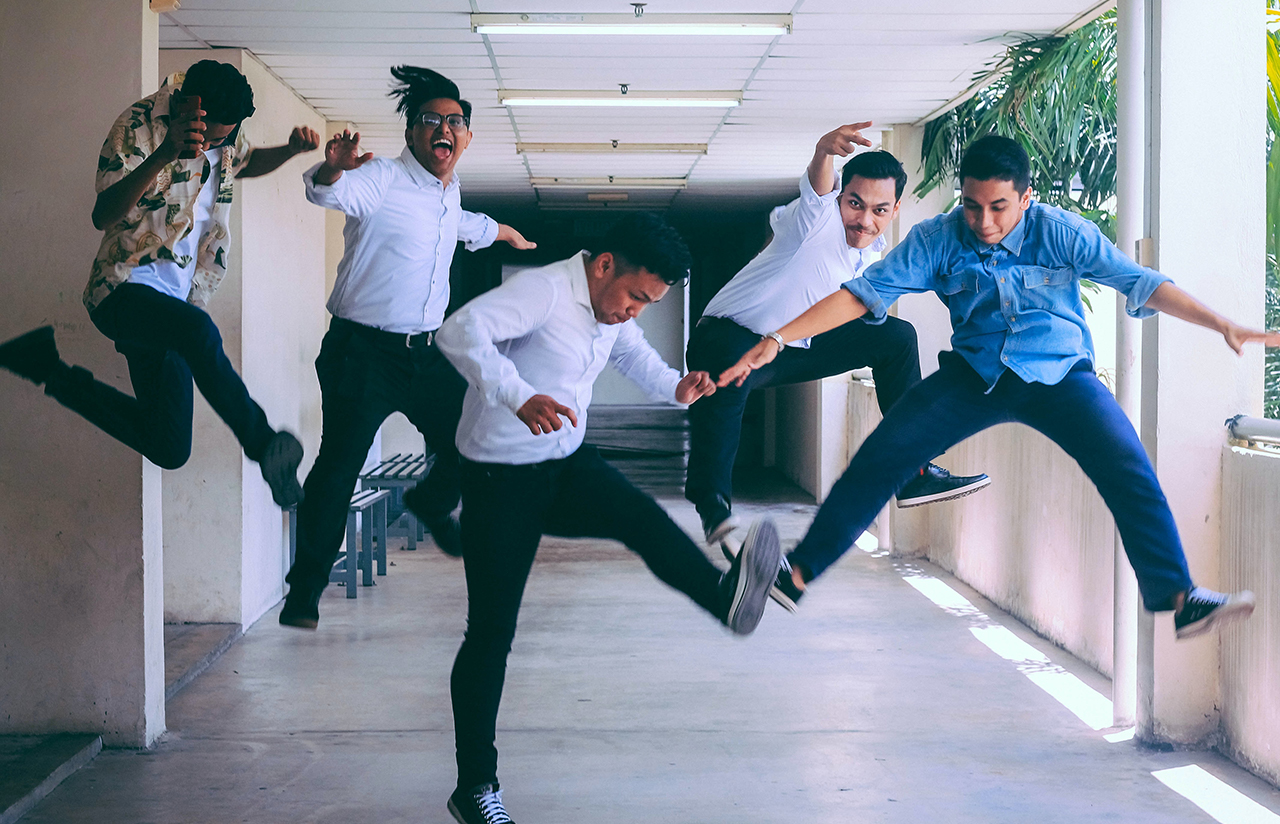 happy employees jumping at culture statement